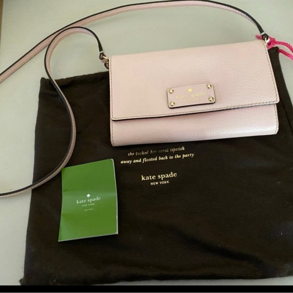 Kate Spade Pink Crossbody Bag with Adjustable Strap and Flap Closure